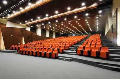 Auditorium seating with orange fabric in Beirut