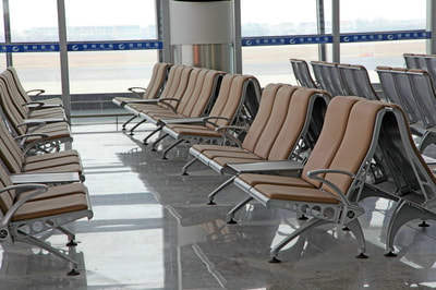 aluminum benches with upholstered seat and back for airport waiting areas